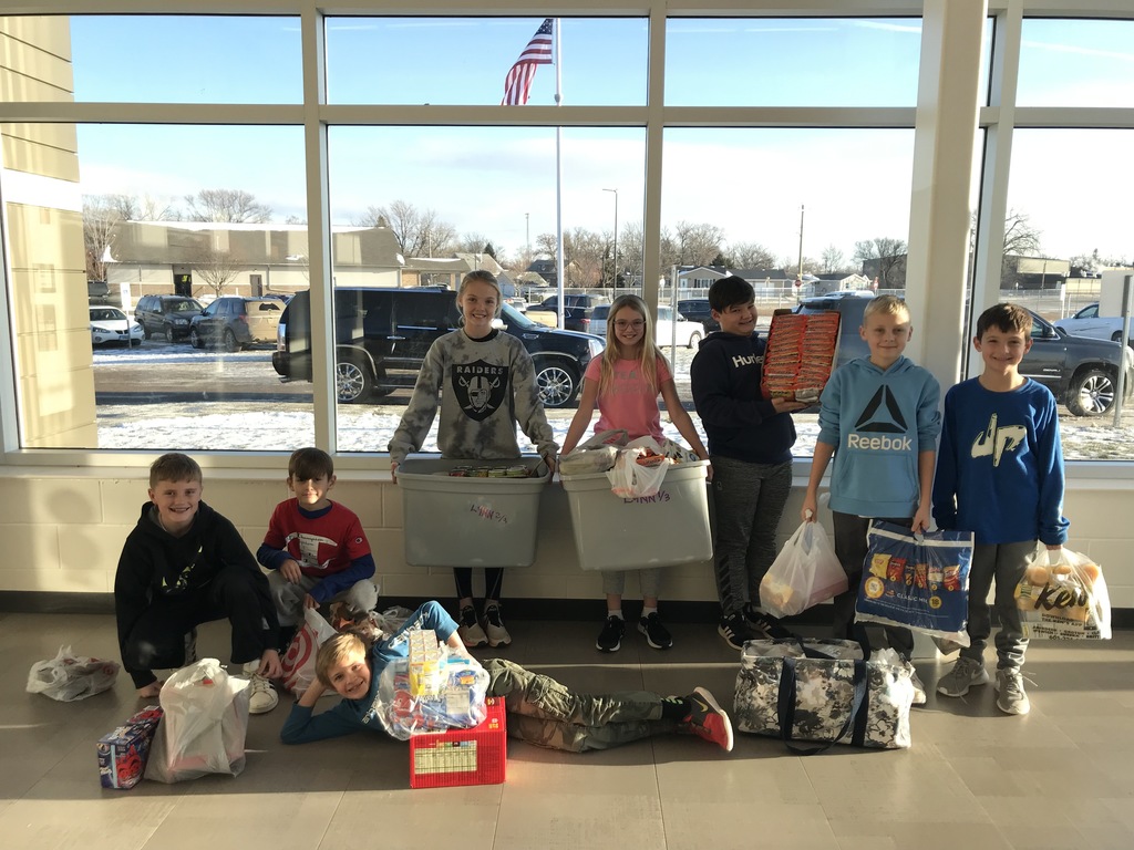 Student Council Members with donated items for the BAGS program.  